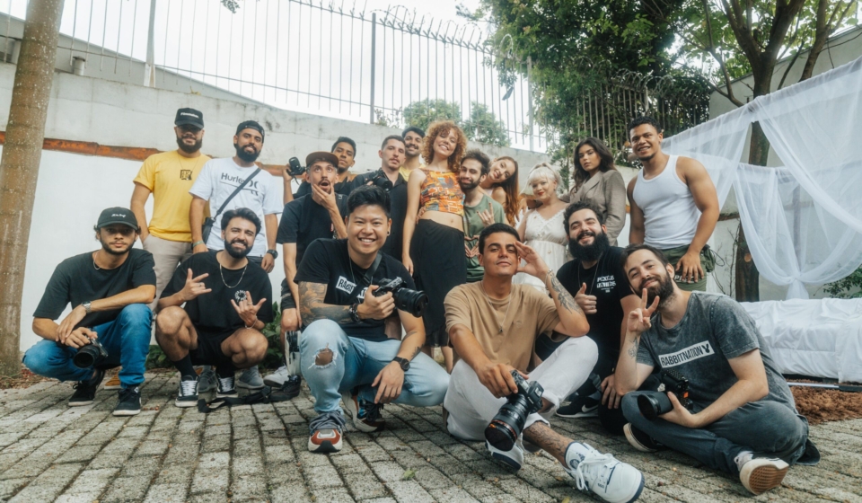 Diverse group of friends having fun and posing for a group photo outdoors in São Paulo.